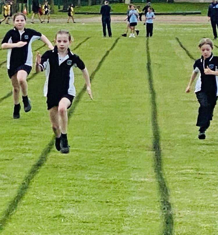 Children running in a sprint race
